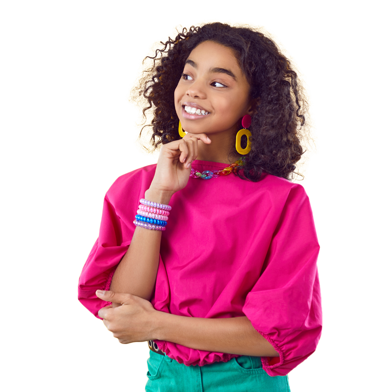 Teen student smiling while holding her chin